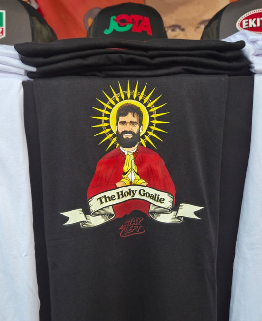 The Holy Goalie T-shirt: 'patron saint of clean sheets' goalkeeper design, available in black or white